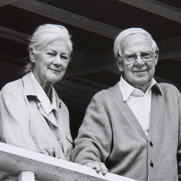 Woman and man standing on a balcony
