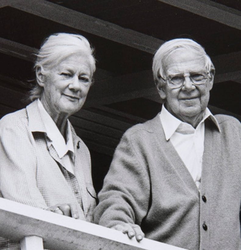 Woman and man standing on a balcony