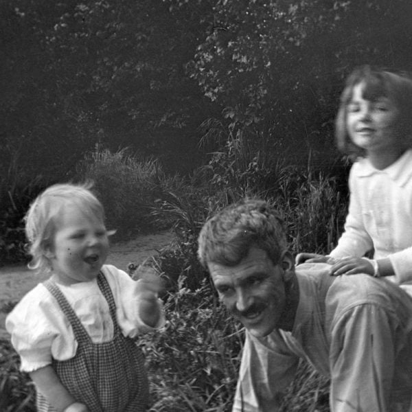 Man playing with two children