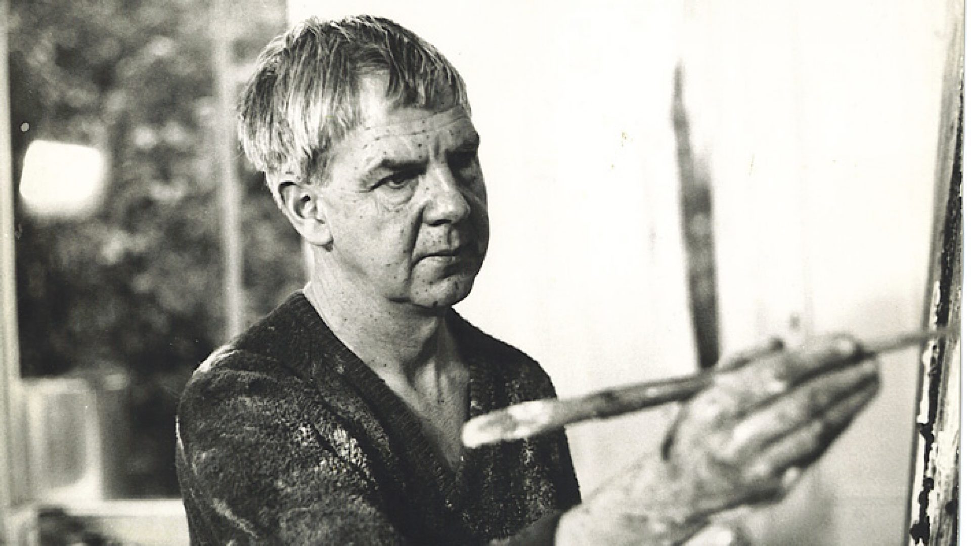 Black and white photo of Arthur Boyd painting