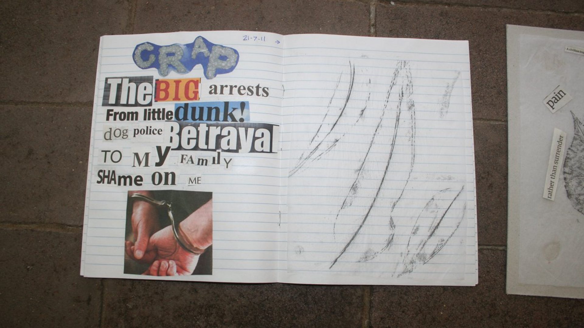 A collage of images and leaf rubbings in a book with the words 'Crap, The big arrests from little dunk! dog police betrayal to my family shame on me