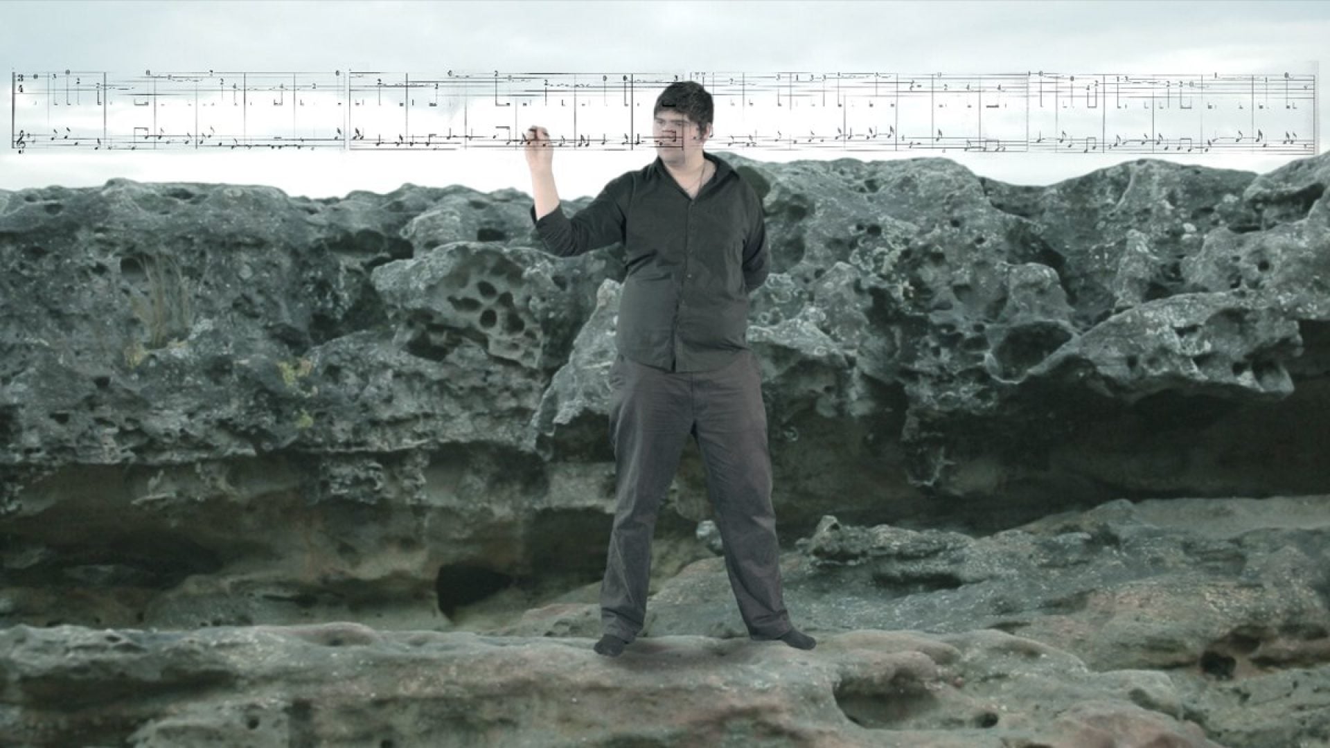 A person standing on rocks
