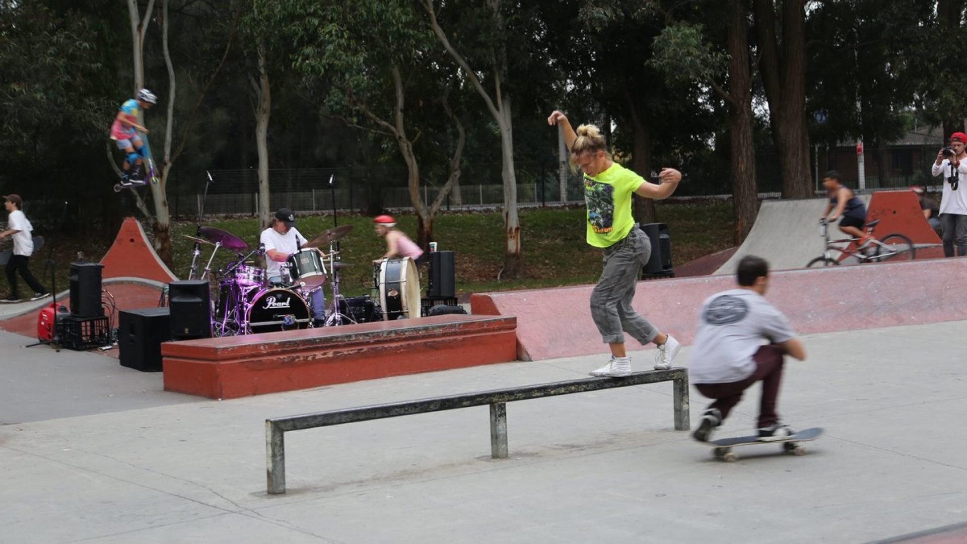 A band performing in a skate park