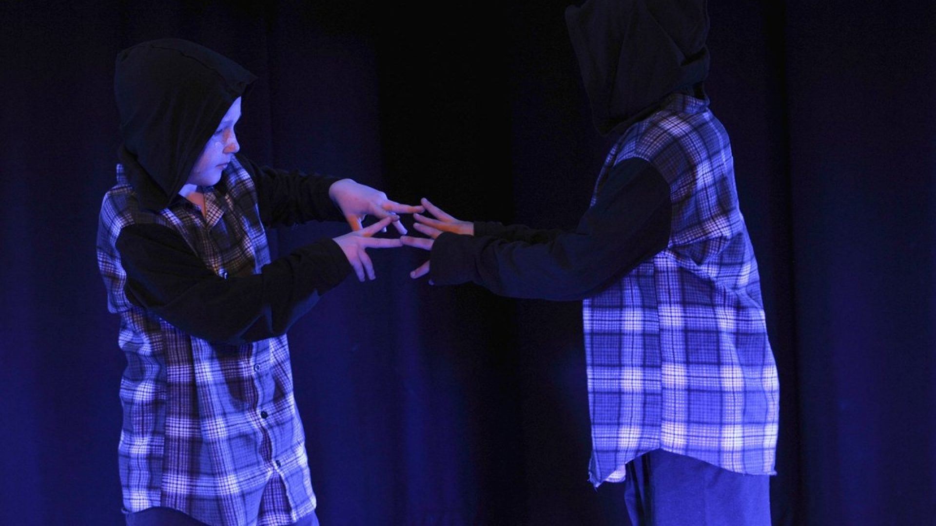 Two young people dancing