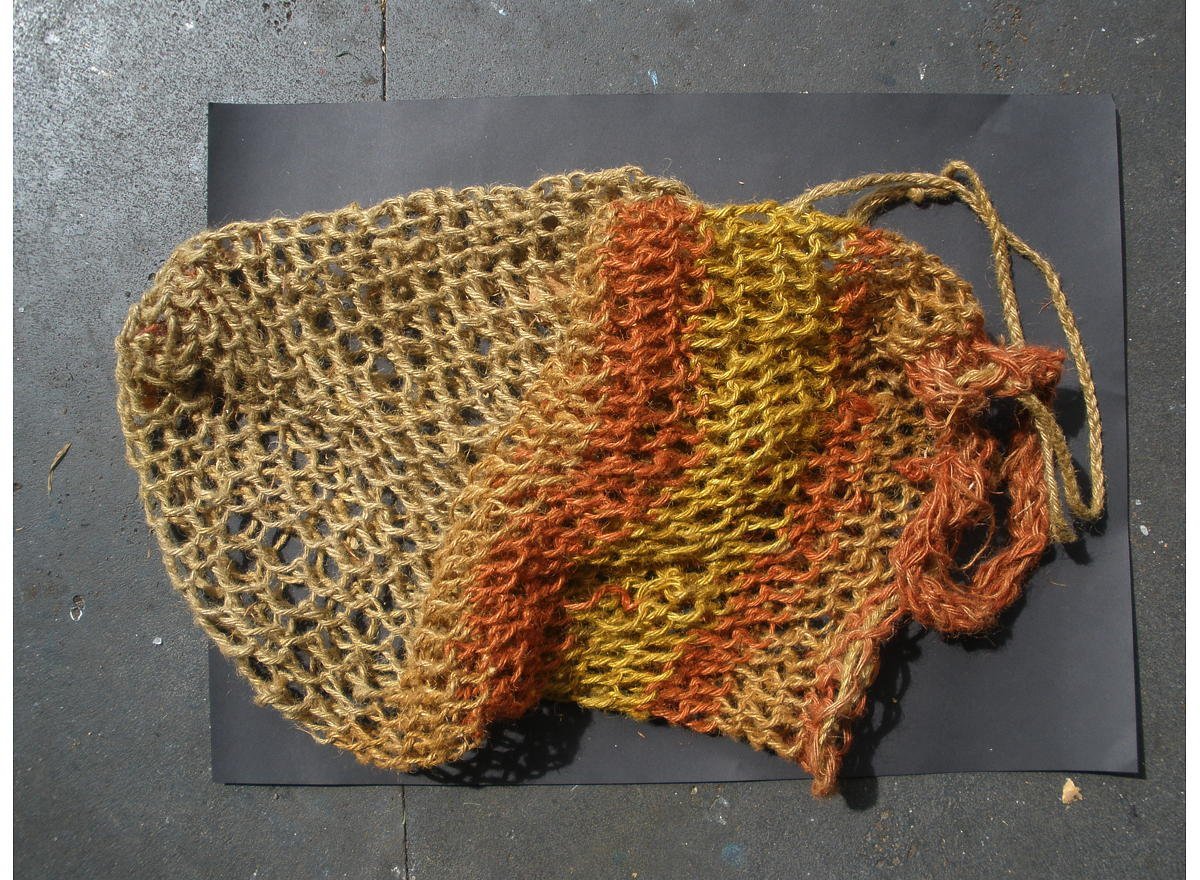 A string mesh bag to carry tools.