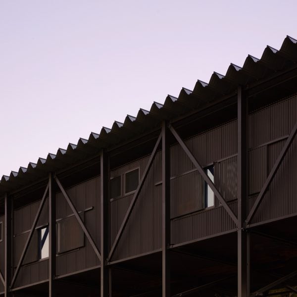 The side of a black metal building