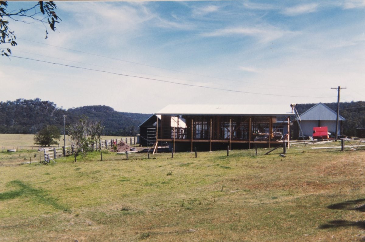 Construction of buildings with mountains in the background