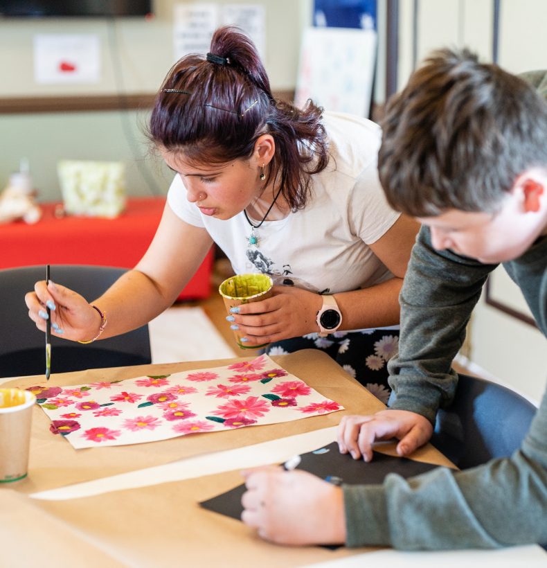 Teenagers painting