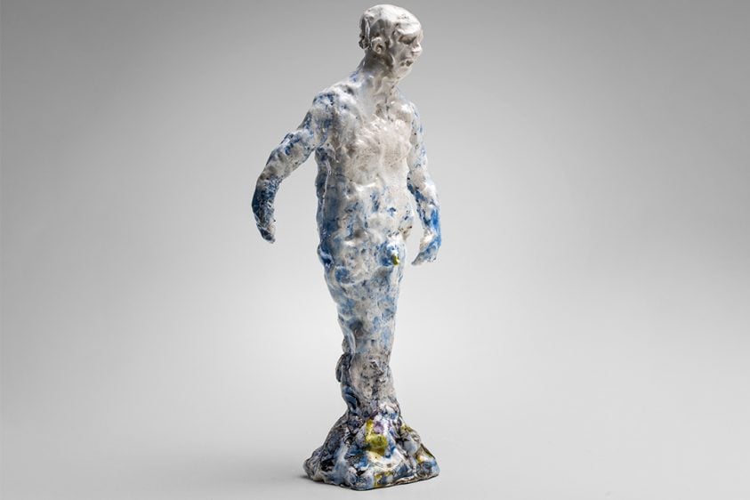 ceramic sculpture of a male figure