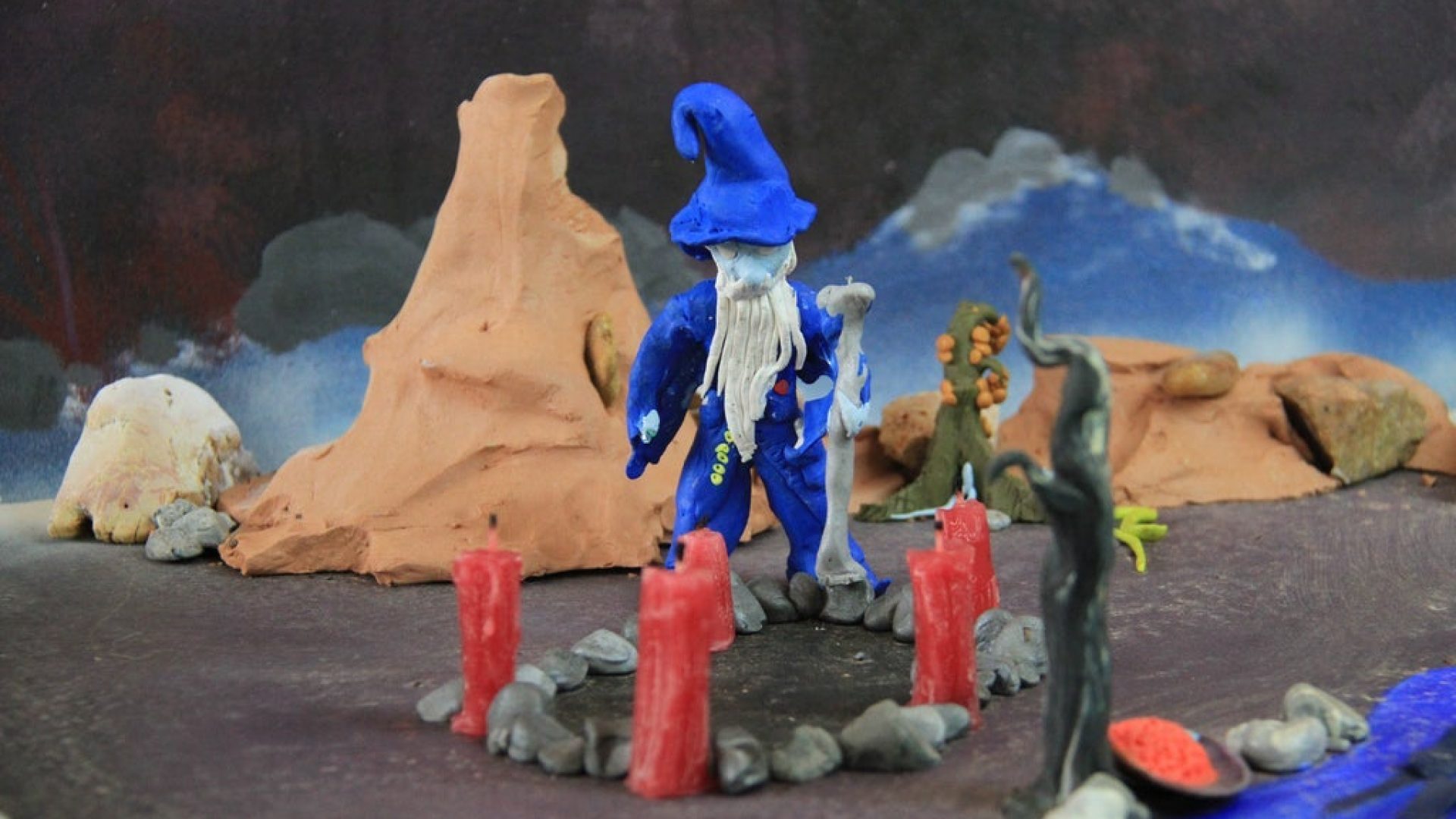 A sculpted scene with a wizard