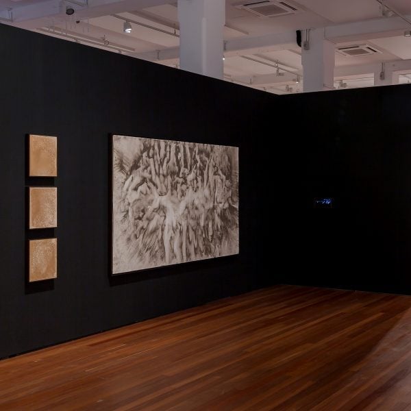 Installation view (left to right):
Fauvette Loureiro Memorial Scholarship 2022
Thresholds #03/05/21, 
2021
Sediment (North Head, Gayamagal land, Sydney) on clayboard, 
42 x 32 x 5cm each
Thresholds: a chorus #19/07/19
2019 
St James Tunnel residue on Heritage rag 320gsm paper
163 x 243cm
Thresholds: 91 days, (Catacombs, Paris) 
2022
HD Video, stereo sound (1:09min)
Photo: Document Photography