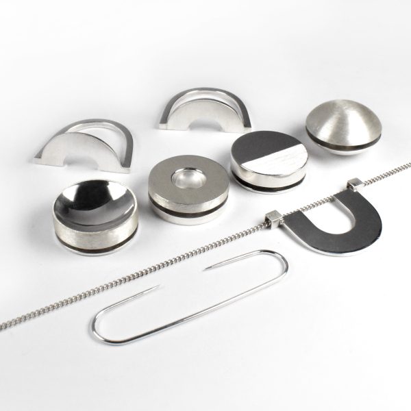 Ensemble I: a series of objects that can be played with, worn a ring that can fit different size fingers, a brooch and a pendant. Photo: Jacki Stone