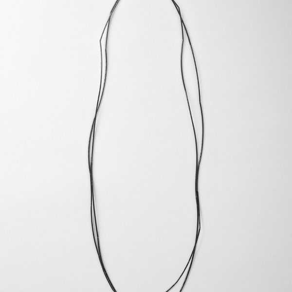 Necklace, 'Cassia' (2024), oxidised sterling silver, silk cord. Photo: Connor Patterson