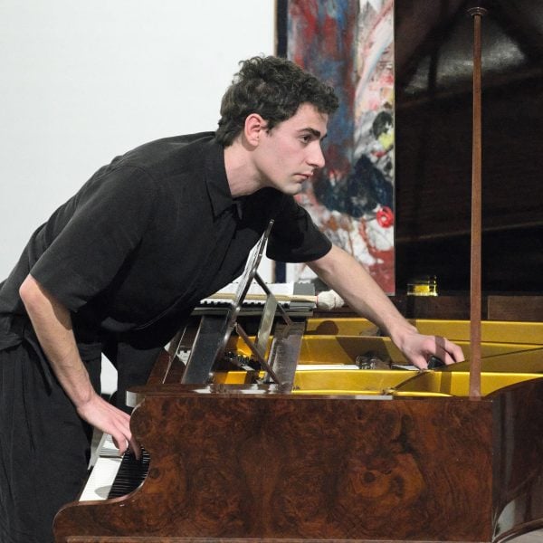 Ronan Apcar improvising at Drill Hall Gallery, Canberra. Photo: Peter Hislop