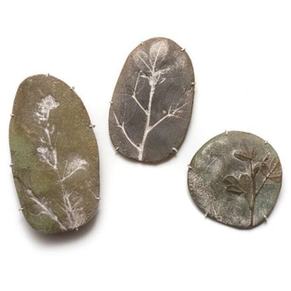 Fossils (brooches), 2018, bottle glass, recycled fine & sterling silver, stainless steel pins. R-L 5cm x 5cm/ 5cm x 7cm / 4.5cm x 9cm, 
