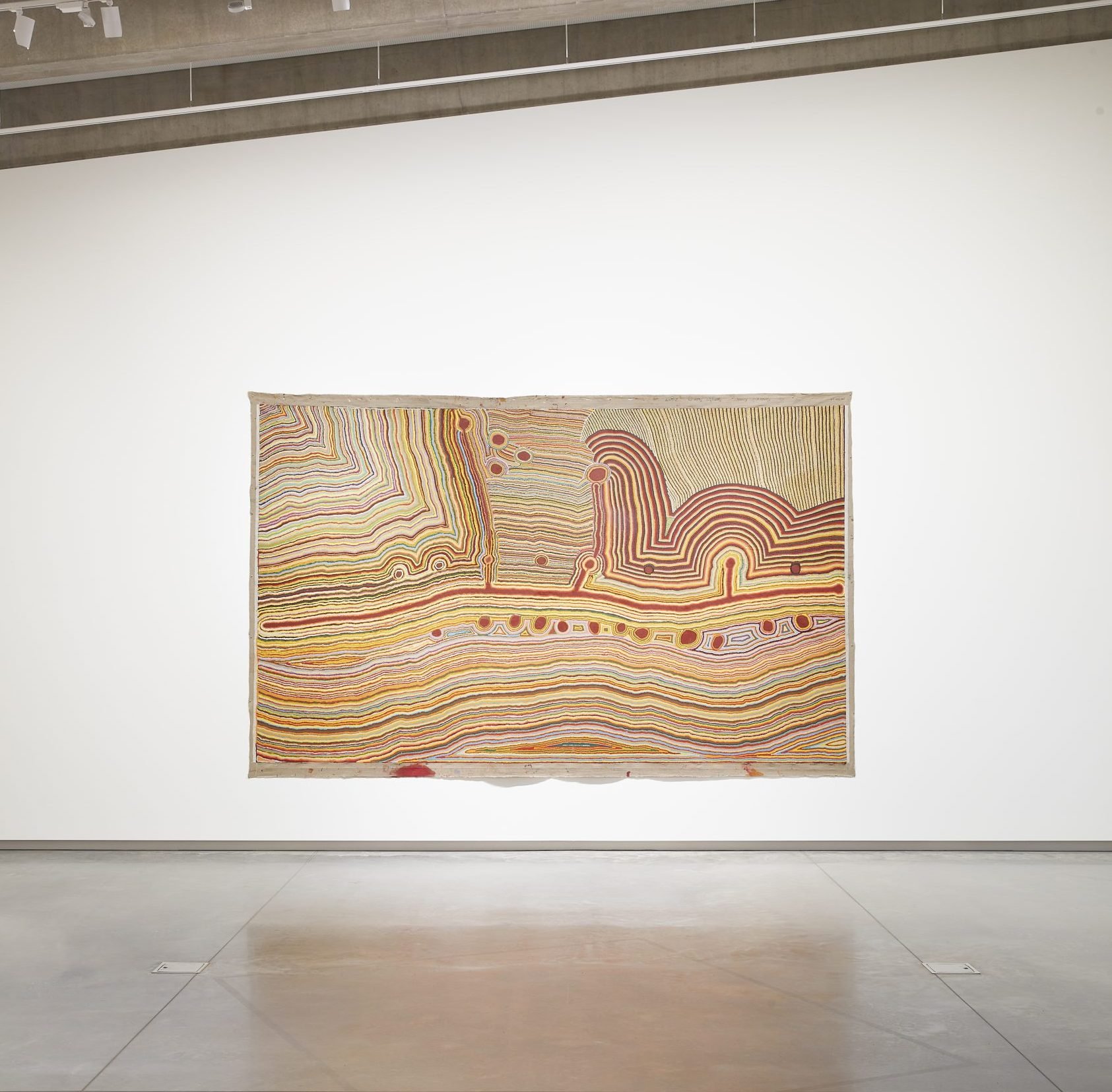 Ngamaru Bidu, J. Biljabu (deceased), Ngarga Thelma Dundan Judson, J. Girgirba (deceased), Kumpaya Girgirba, Ngalangka Nola Taylor Martumili Ngurra (This is all Martu’s Home), 2009, acrylic on canvas, 324cm x 509cm. Collection of National Museum Australia. Photo by Zan Wimberley.	  