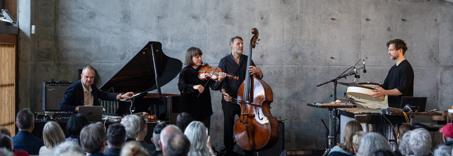 People playing music on stage