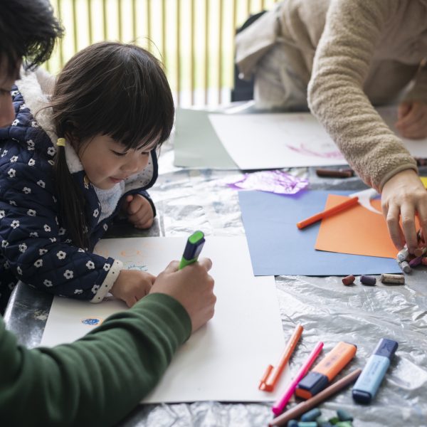 Child drawing in workshop