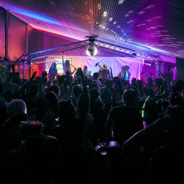 Party people under a disco ball
