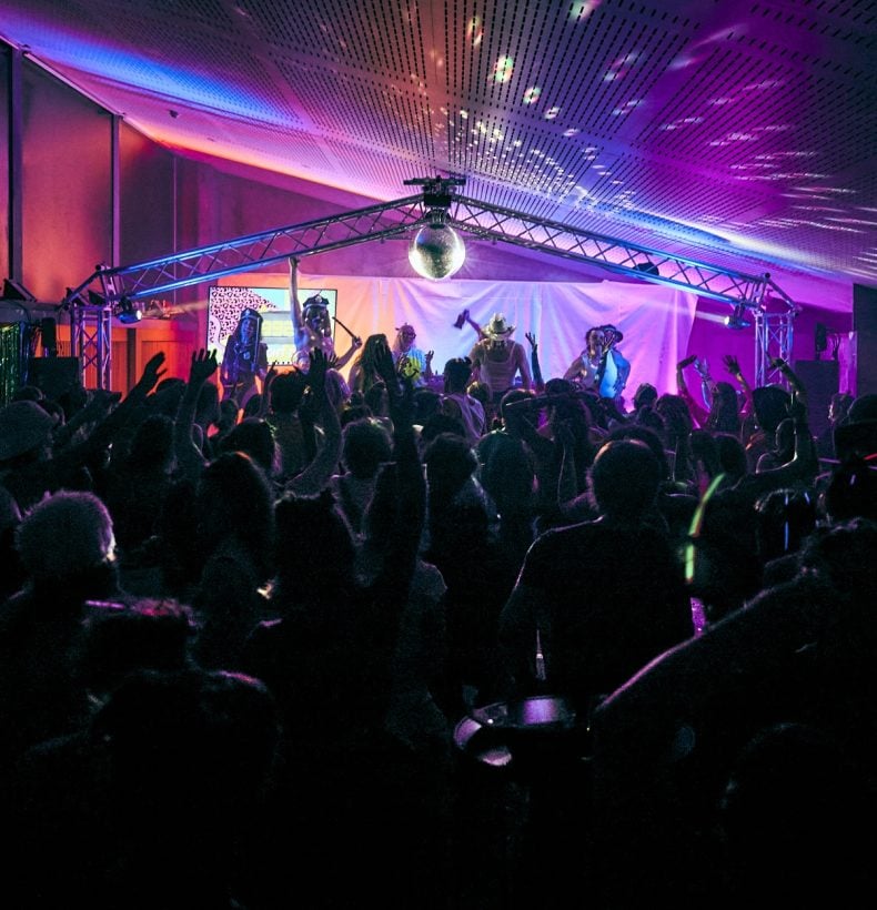 Party people under a disco ball