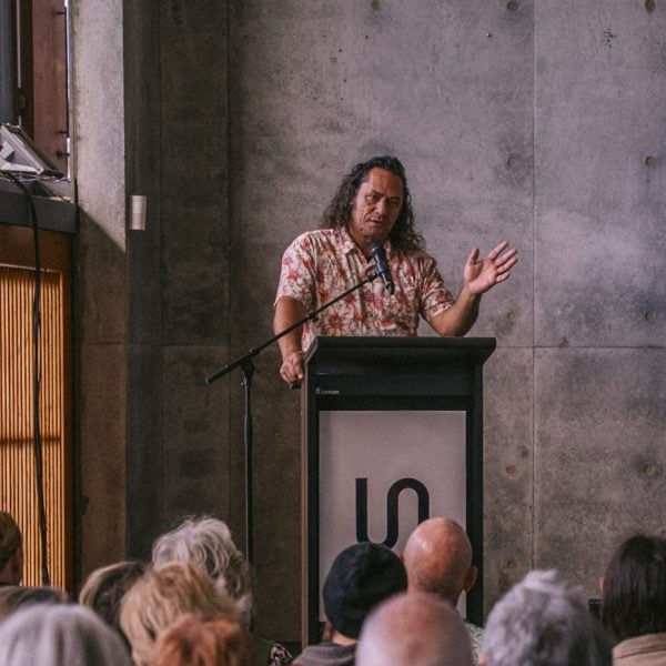 Person speaking at science symposium event.