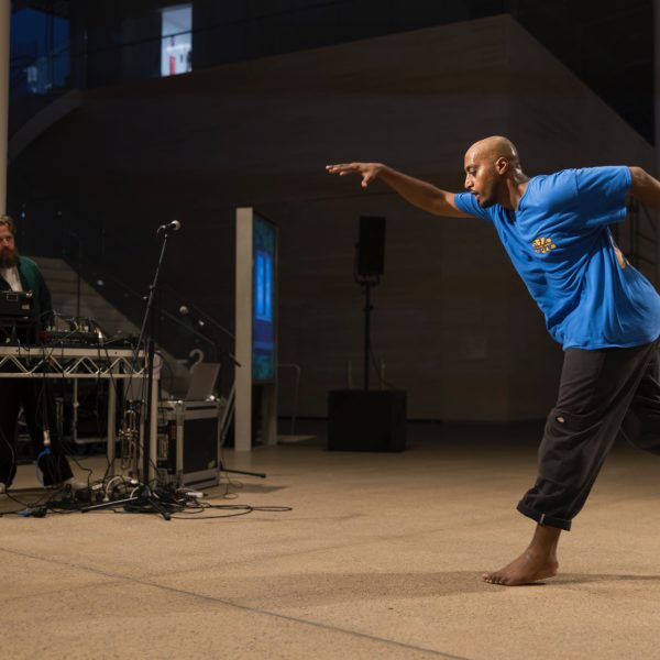 Musician and dancer perform