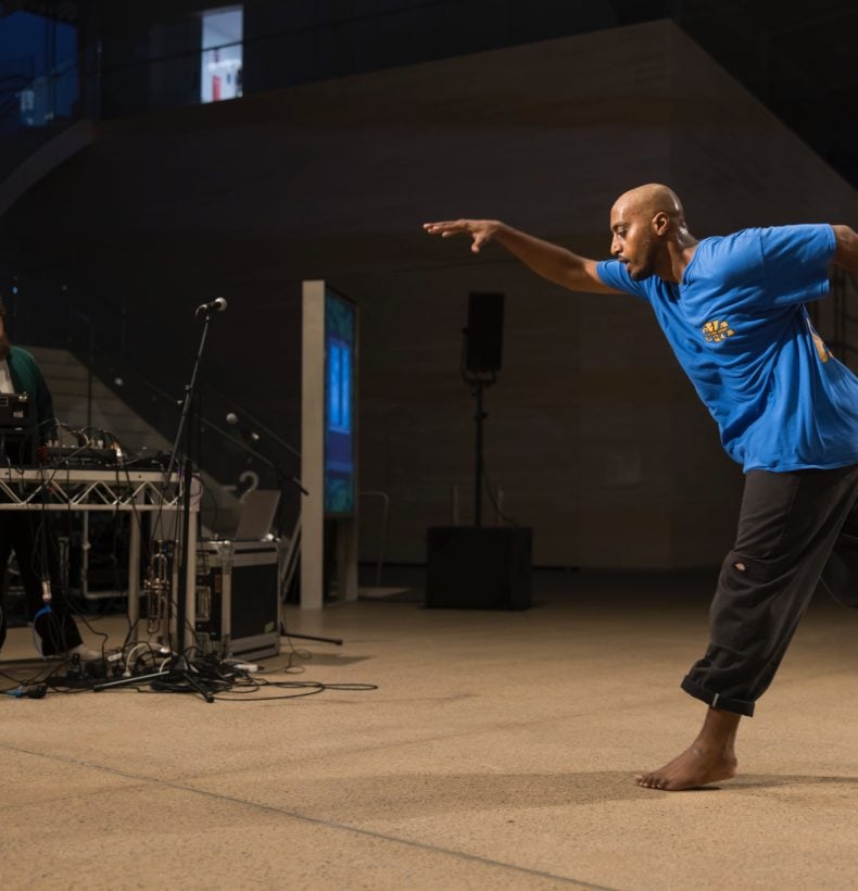 Musician and dancer perform