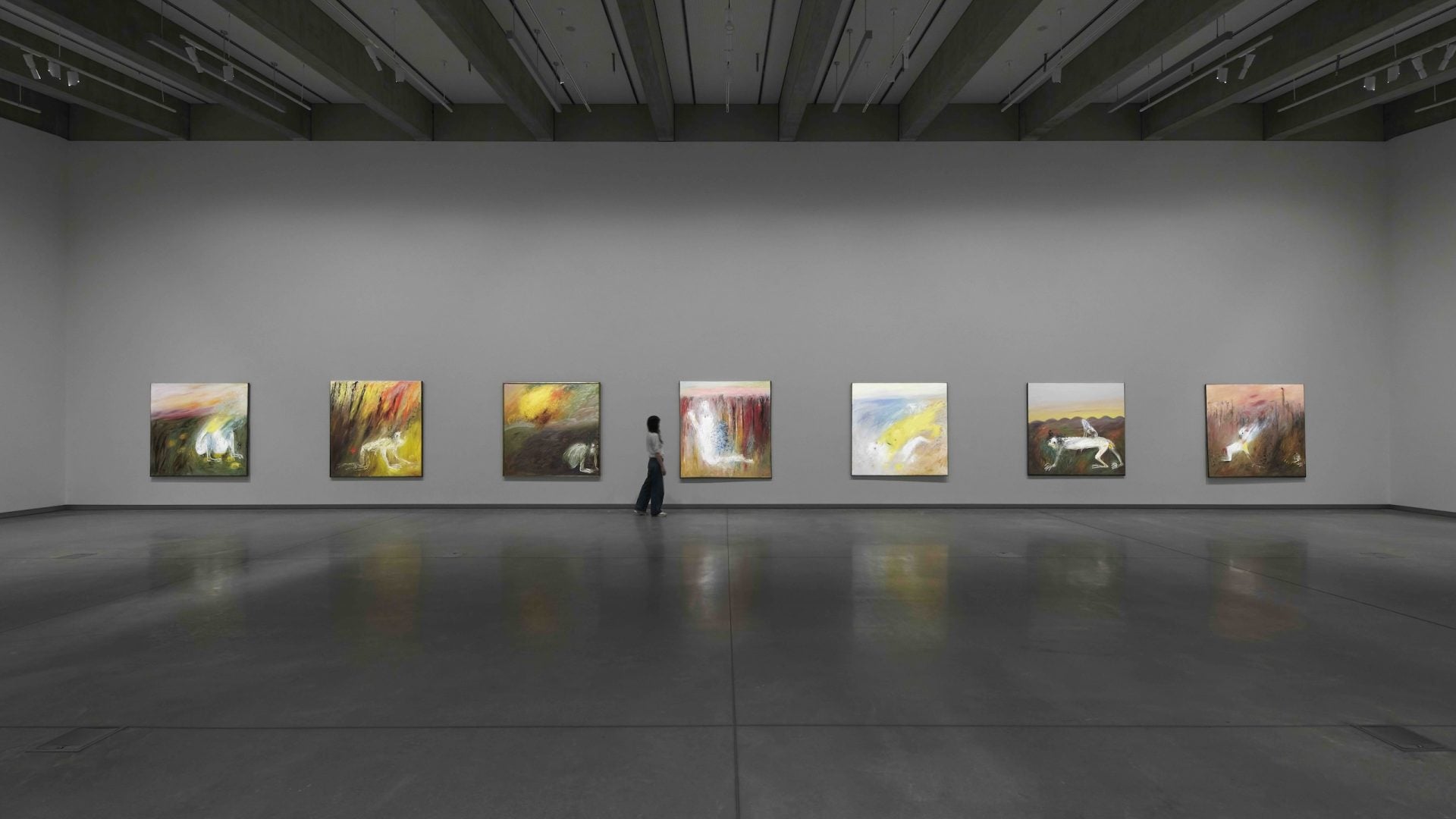 7 artworks installed on a wall