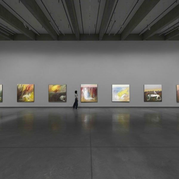 7 artworks installed on a wall
