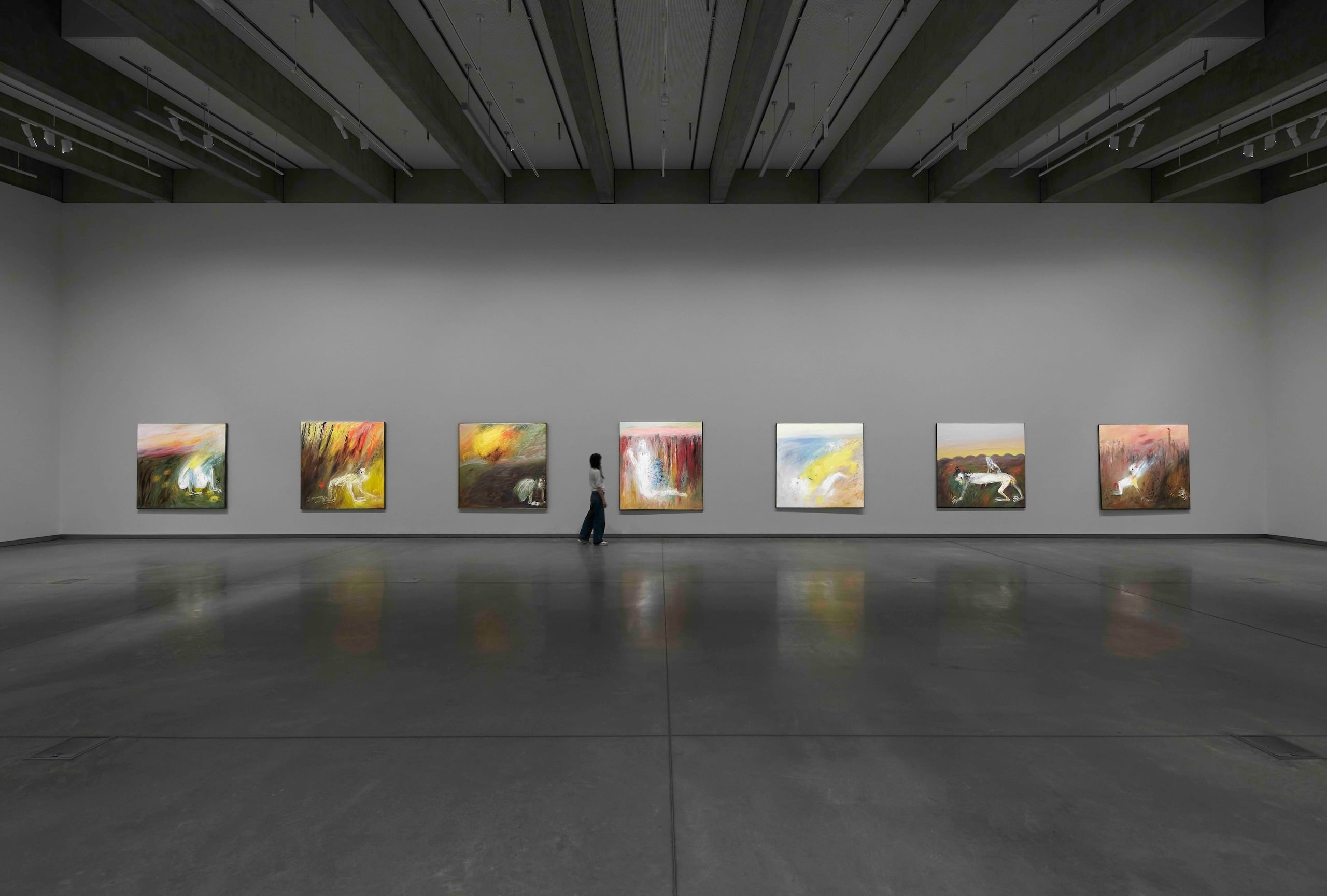 7 artworks installed on a wall