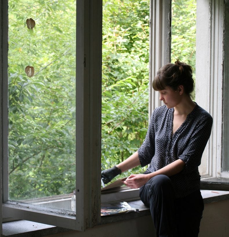 Madison Baird in Studio window